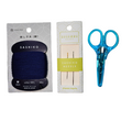 Sashiko tool set with blue scissors, black sashiko tool, and wooden needles on a white background
