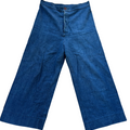 Blue denim pants on a white background