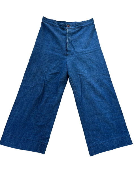 Blue denim pants on a white background